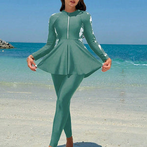 Long sleeved skirt style top swimsuit