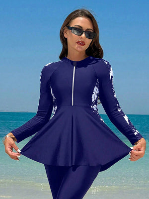 Long sleeved skirt style top swimsuit
